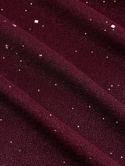 Vestido largo con cuello vuelto y volantes