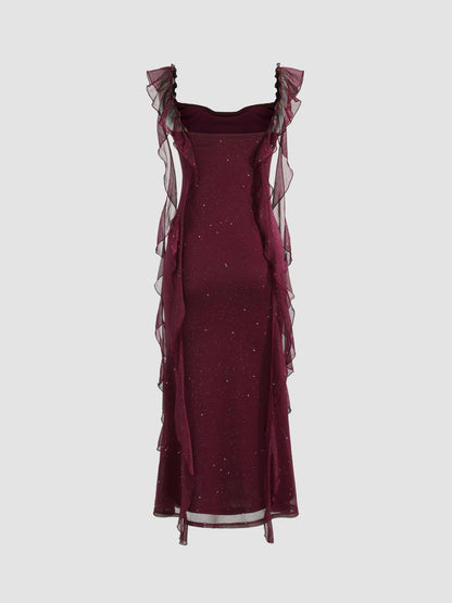 Vestido largo con cuello vuelto y volantes