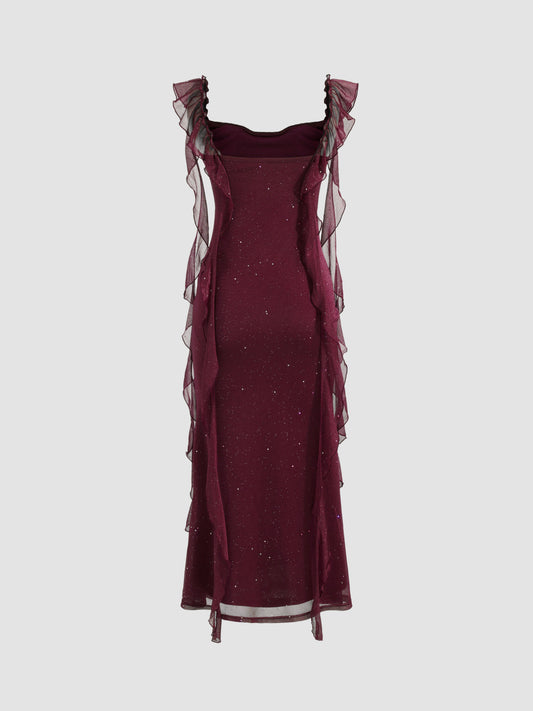 Vestido largo con cuello vuelto y volantes