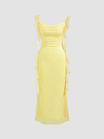 Vestido largo con cuello vuelto y volantes